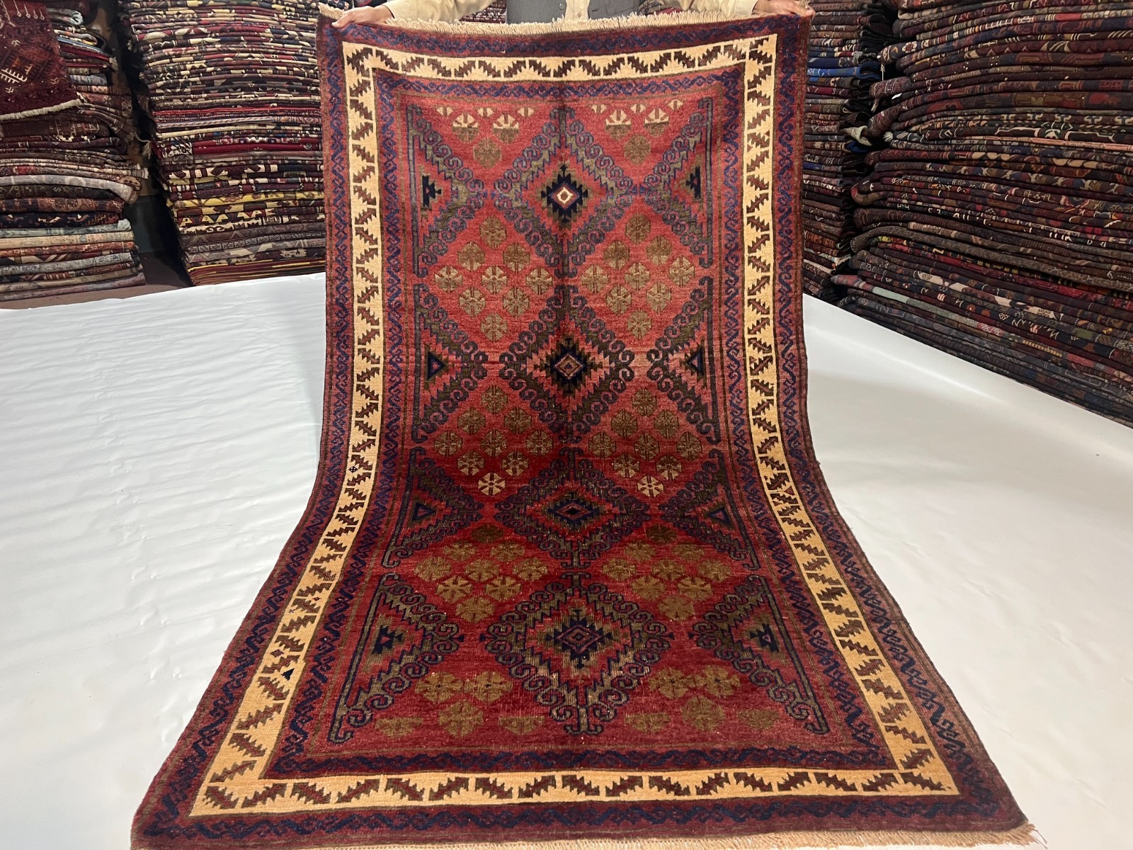 4×6 Vintage Baluchi Wool Rug with Triple Geometric Medallions and Tribal Border
