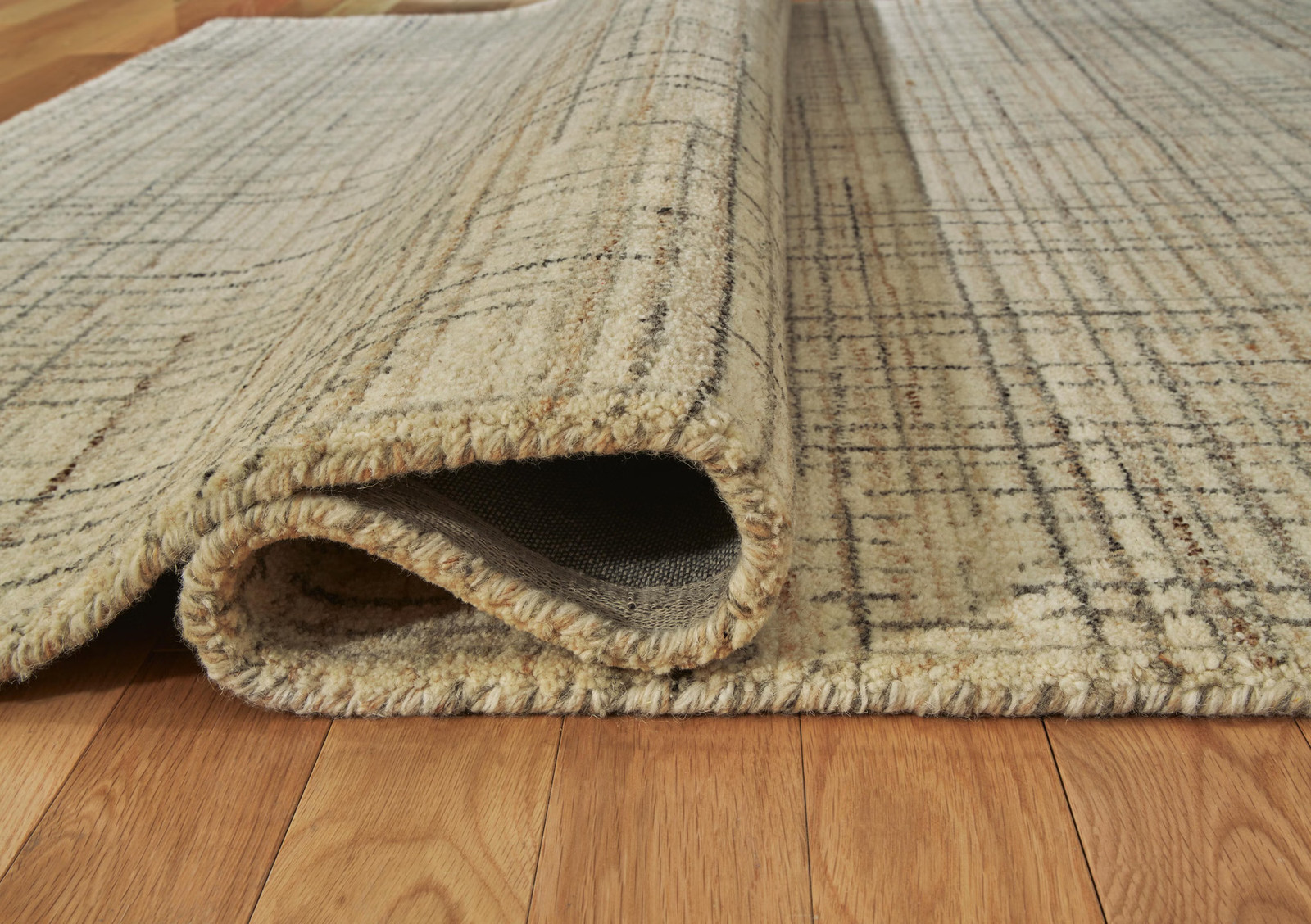 Signature Design by Ashley Janston 5′ x 7′ Area Rug, Ivory Gray Tan Plaid