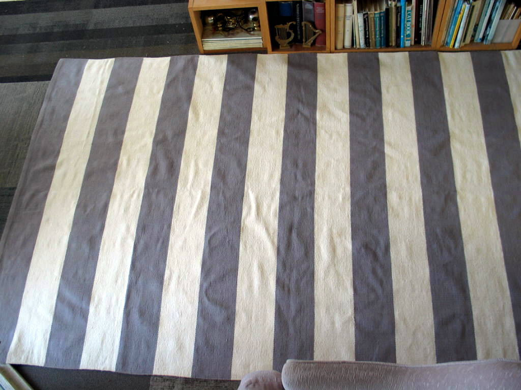No-label cotton(?) flat woven area rug 5×8 or 2 orange & brown jute rugs 30″x50″
