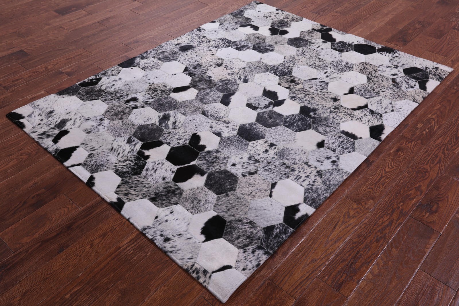 5′ 0″ X 6′ 7″ Black & White Natural Cowhide Hand Stitched Rug – C3446