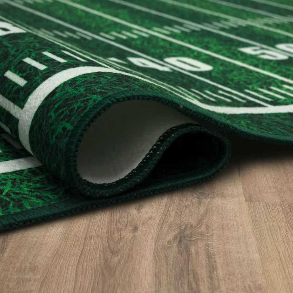 Tailgate Green Football 4 Ft. X 8 Ft. Novelty Area Rug