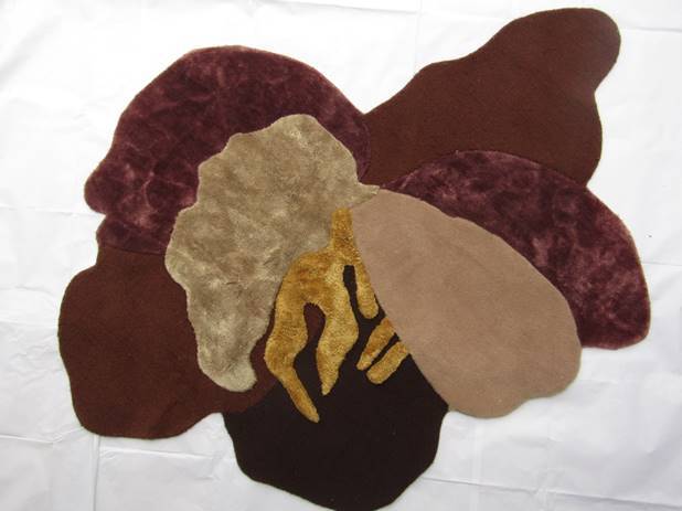 Abstract pattern Irregular Shaped Hand tufted Wool rug Multicolored