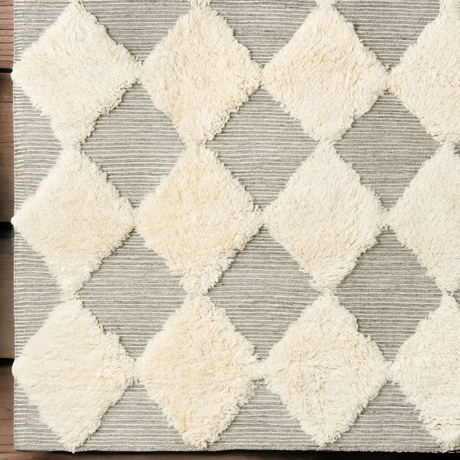 Classic Elegance Wool Rug: Handcrafted wool rug with a minimalist design.