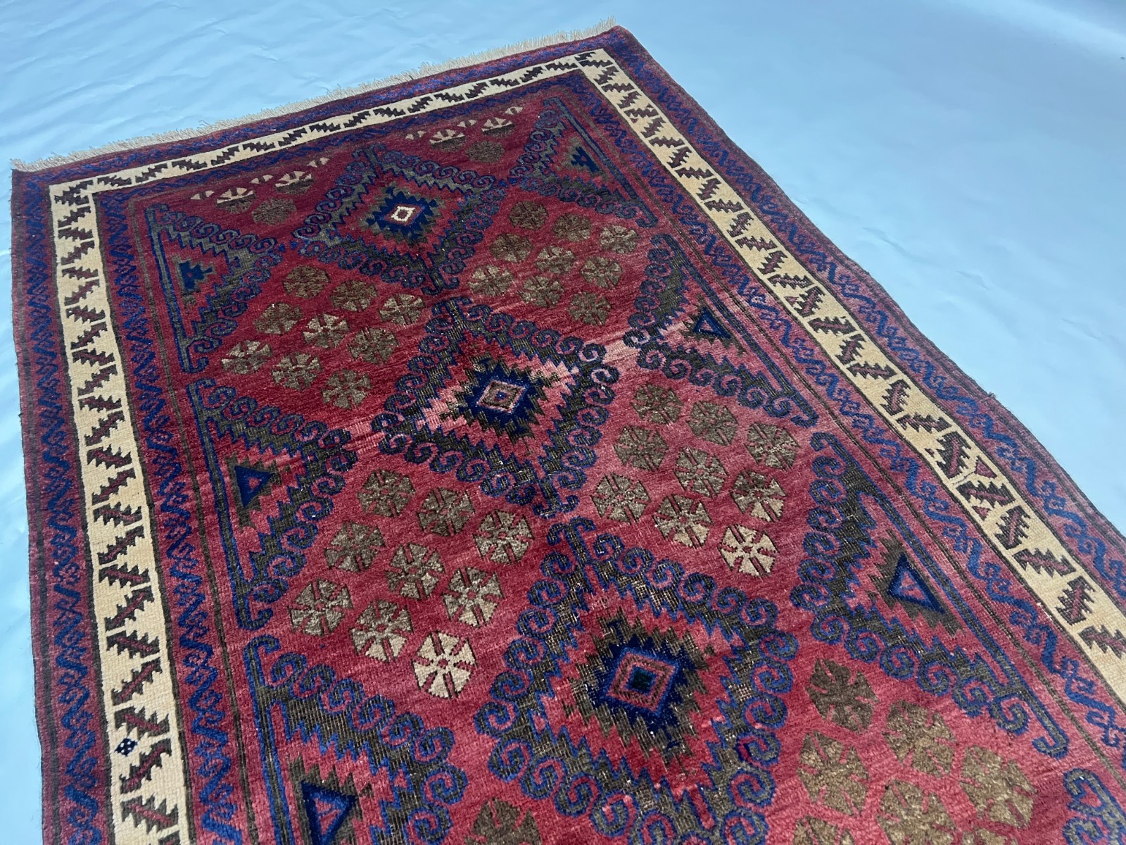 4×6 Vintage Baluchi Wool Rug with Triple Geometric Medallions and Tribal Border