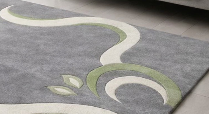 High quality grey carpet with cream & olive green flowing design.