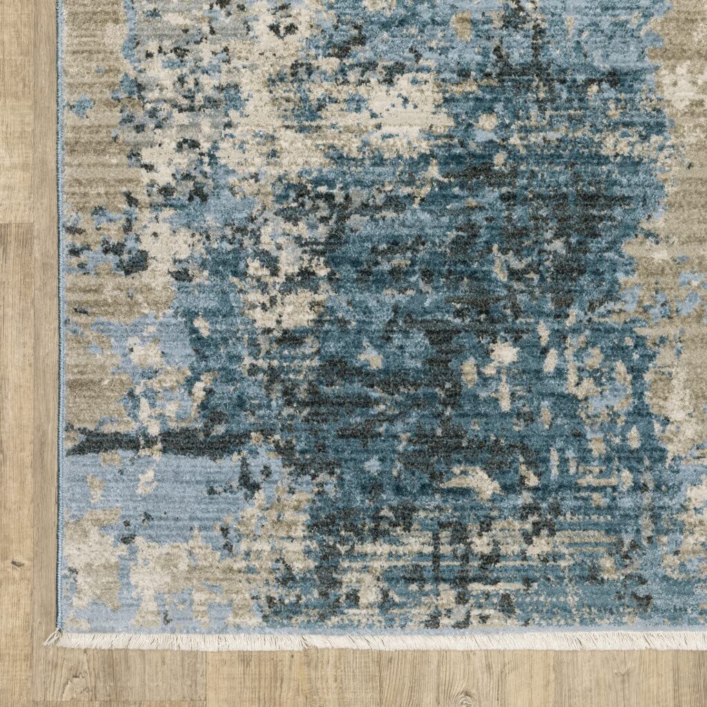 8′ X 11′ Blue Grey Ivory Light Blue And Dark Blue Abstract Power Loom Stain