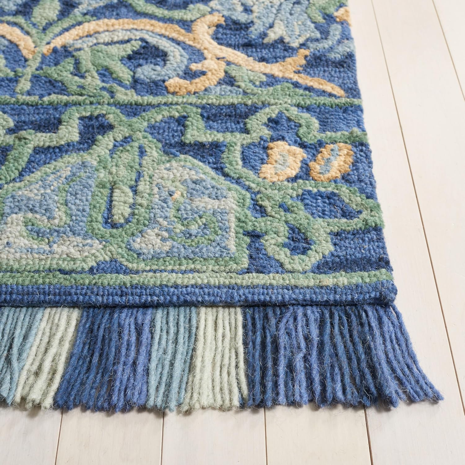 Blossom Collection 3′ x 5′ Handmade Navy/Green Wool Fringe Area Rug