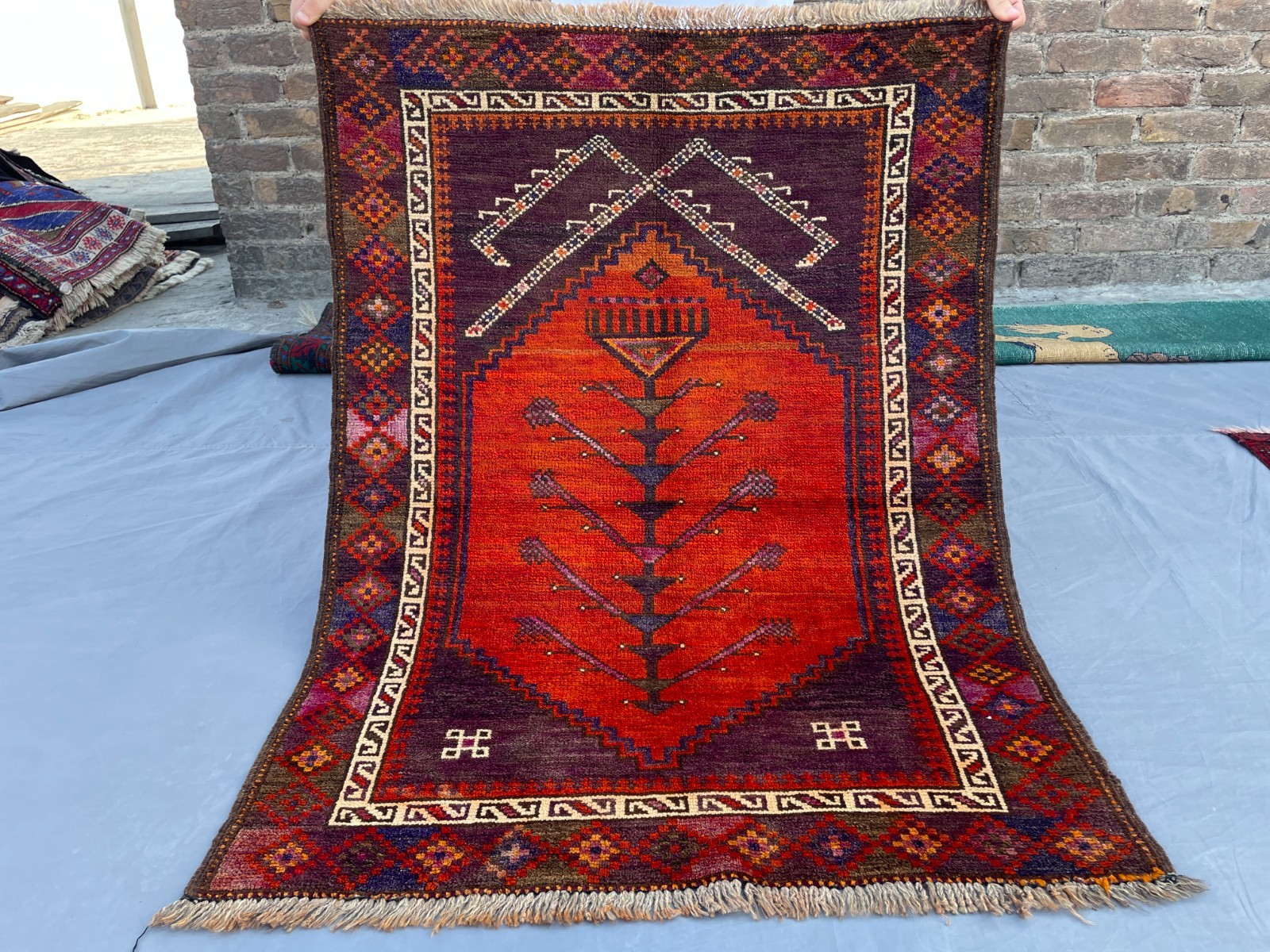 2×3 Baluchi Tribal Rug with Arched Medallion Field and Geometric Floral Borders
