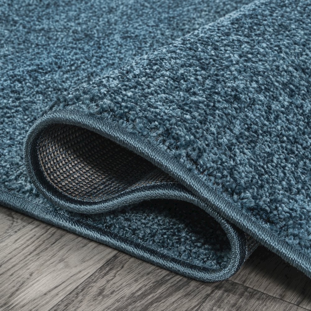 Haze Solid Low Pile Area Rug Turquoise