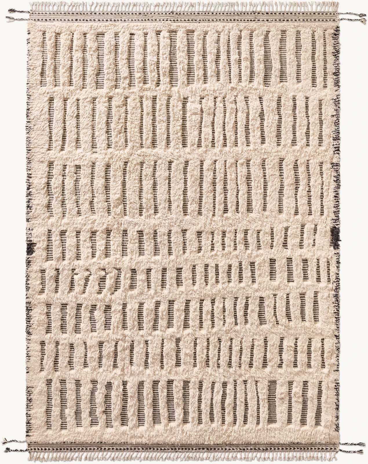 Dashed lines appear hewn into Allali’s plush pile, the meditative grid of free-