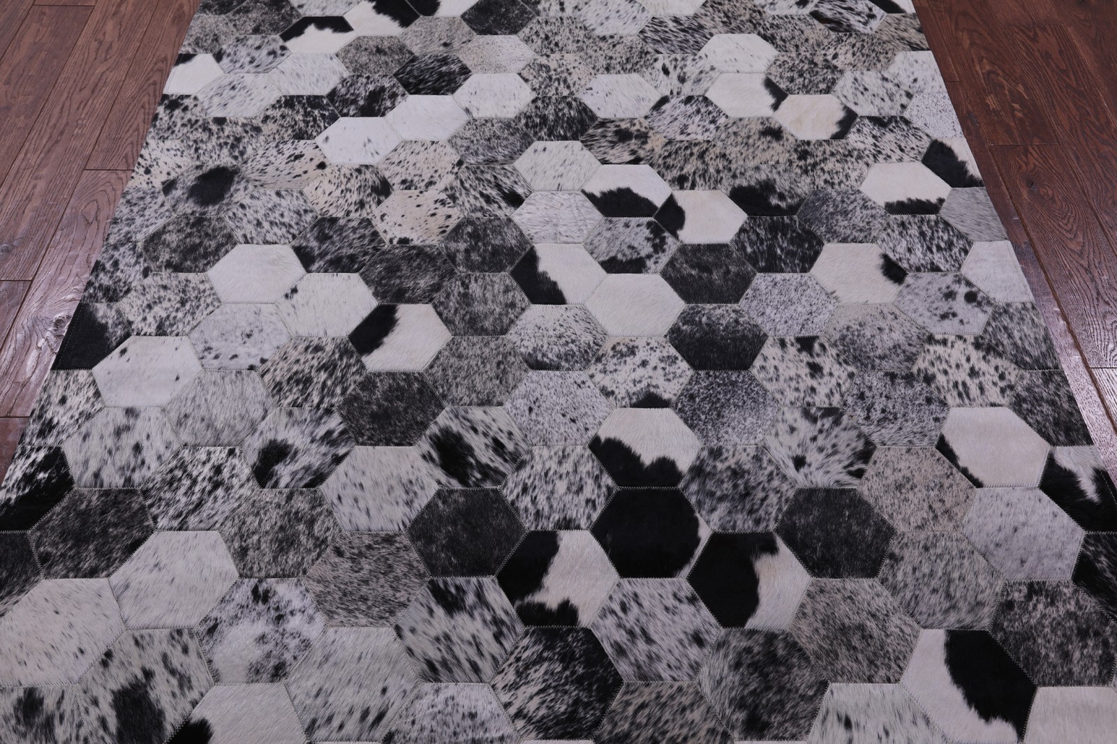 5′ 0″ X 6′ 7″ Black & White Natural Cowhide Hand Stitched Rug – C3446