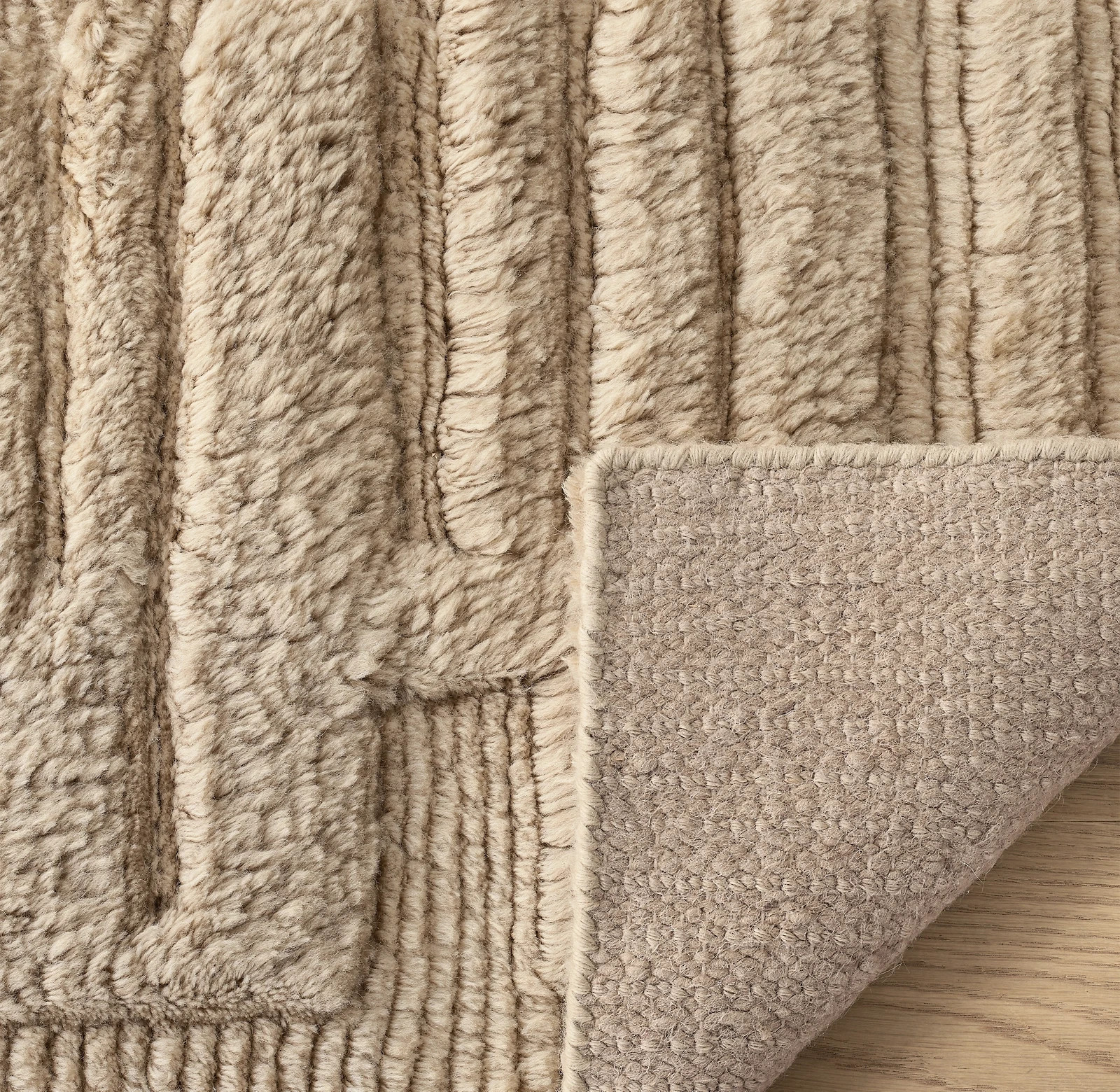 hand knot the long, lush pile from hand-spun New Zealand wool, prized for its re