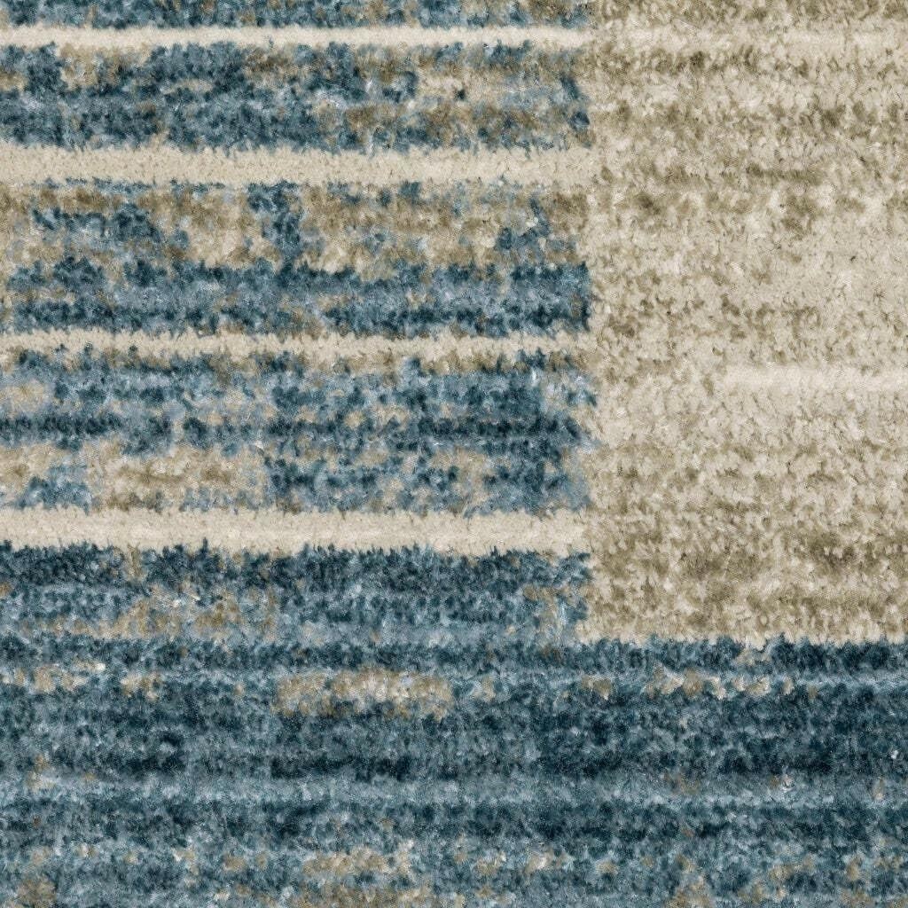 5′ X 8′ Blue Dark Blue Teal Grey Ivory Beige And Tan Geometric Power Loom Stain