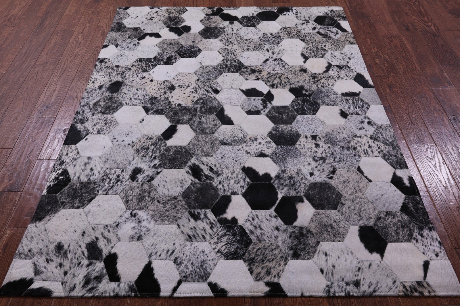 5′ 0″ X 6′ 7″ Black & White Natural Cowhide Hand Stitched Rug – C3446