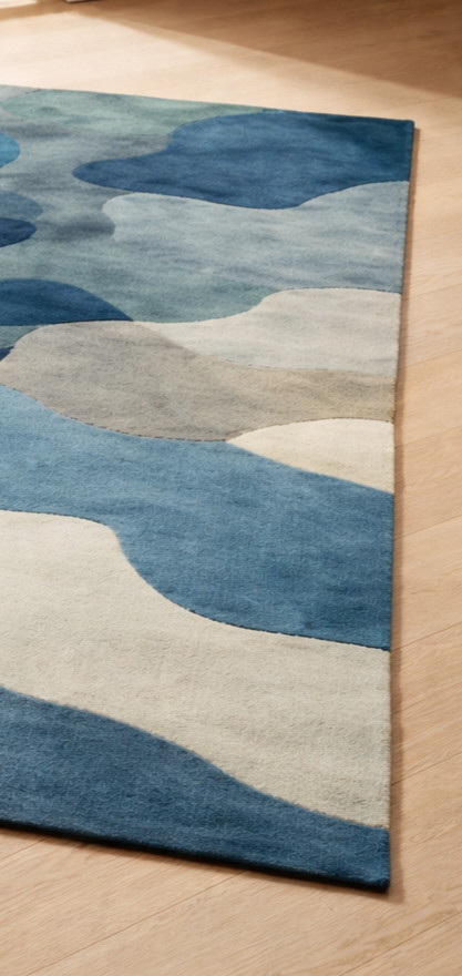 Ocean drift abstract blue & ivory modern art area rug for contemporary living .