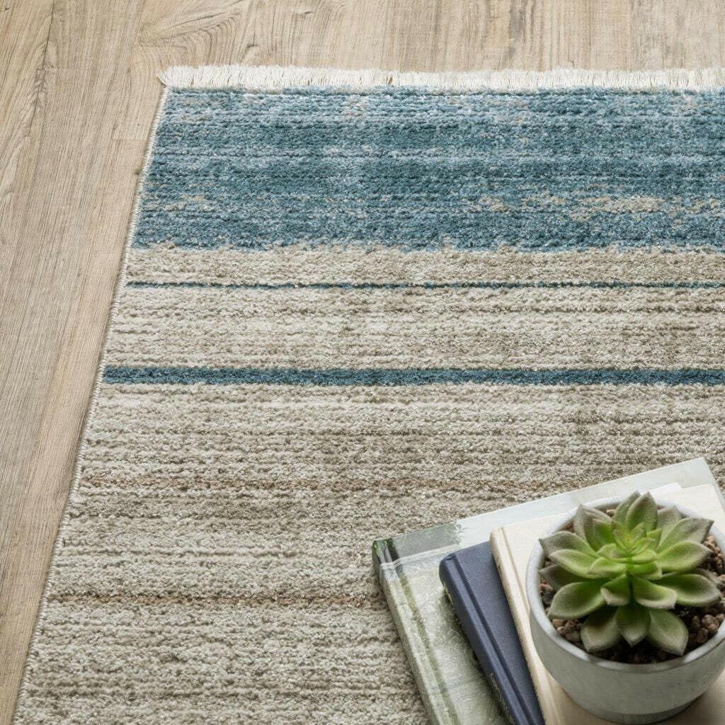 5′ X 8′ Blue Dark Blue Teal Grey Ivory Beige And Tan Geometric Power Loom Stain
