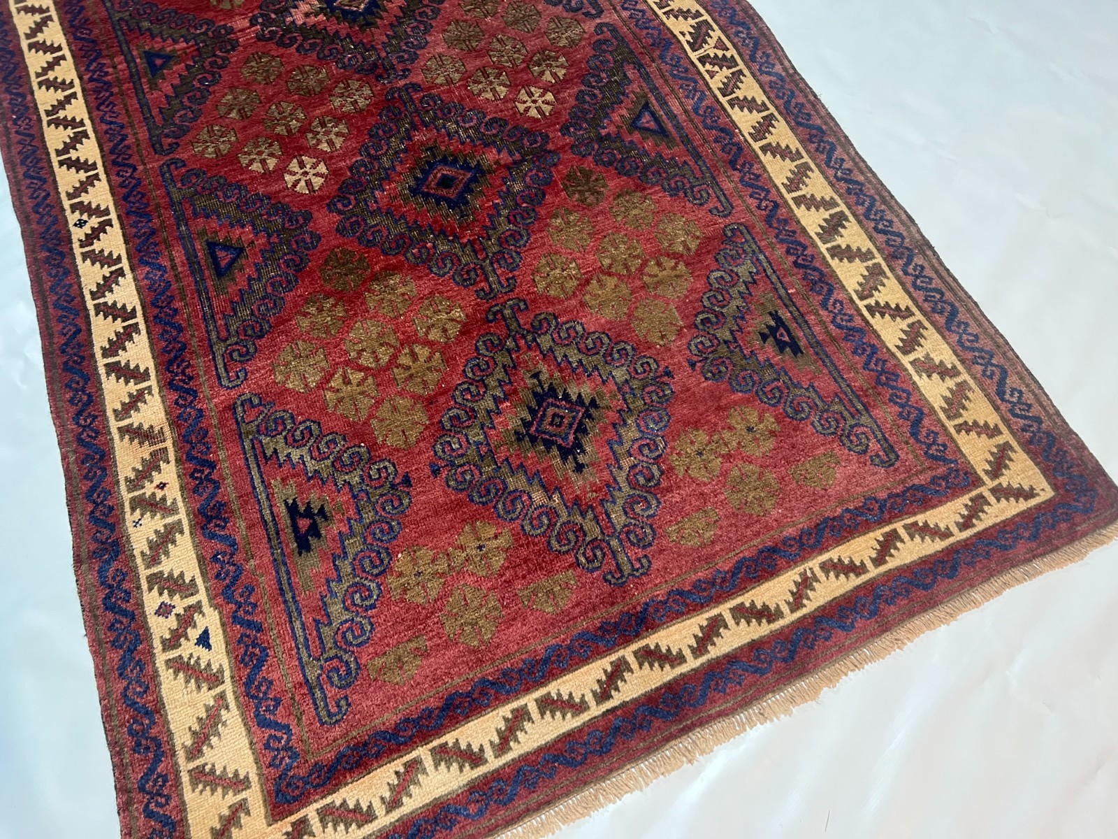 4×6 Vintage Baluchi Wool Rug with Triple Geometric Medallions and Tribal Border